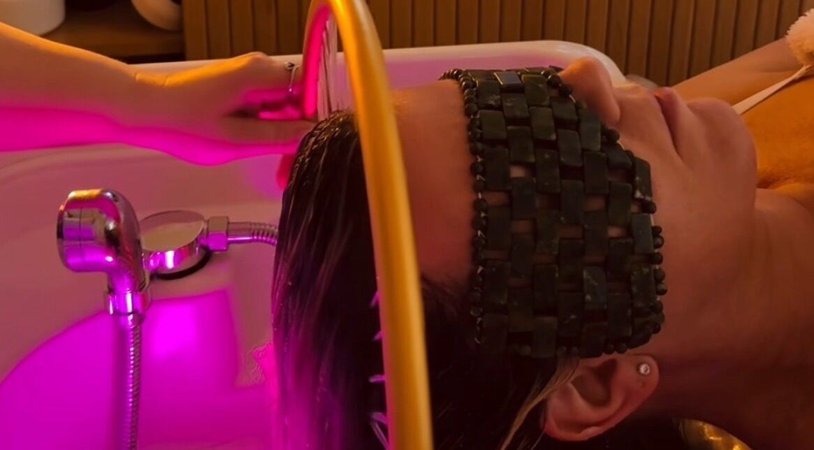 Relaxing head treatment at The Head Spa Suite, Inverness, Scotland, GB with ambient lighting and eye mask.