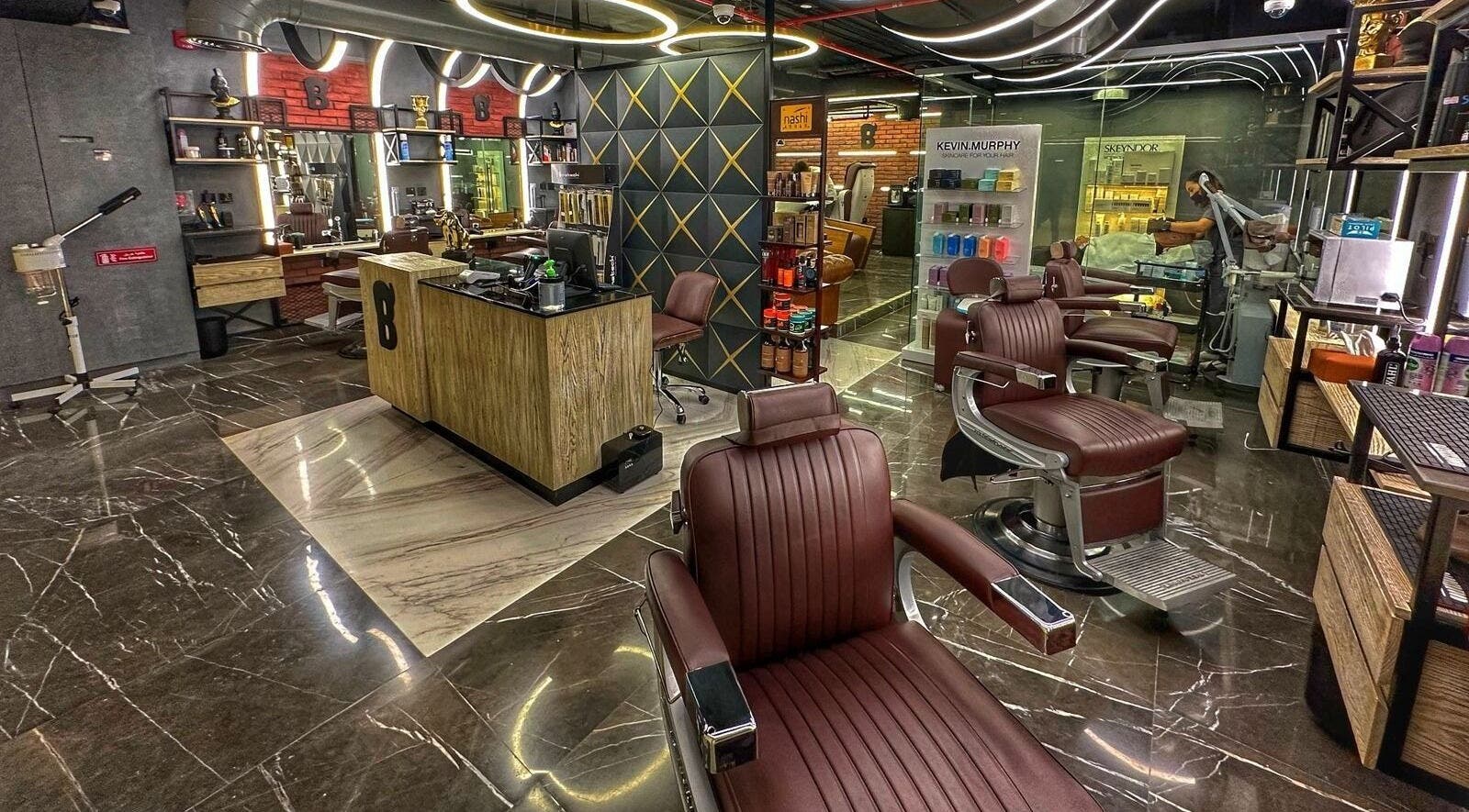 Modern barber interior at Bekky Barber - Dubai Hills Mall, Dubai, AE featuring stylish chairs and decor.