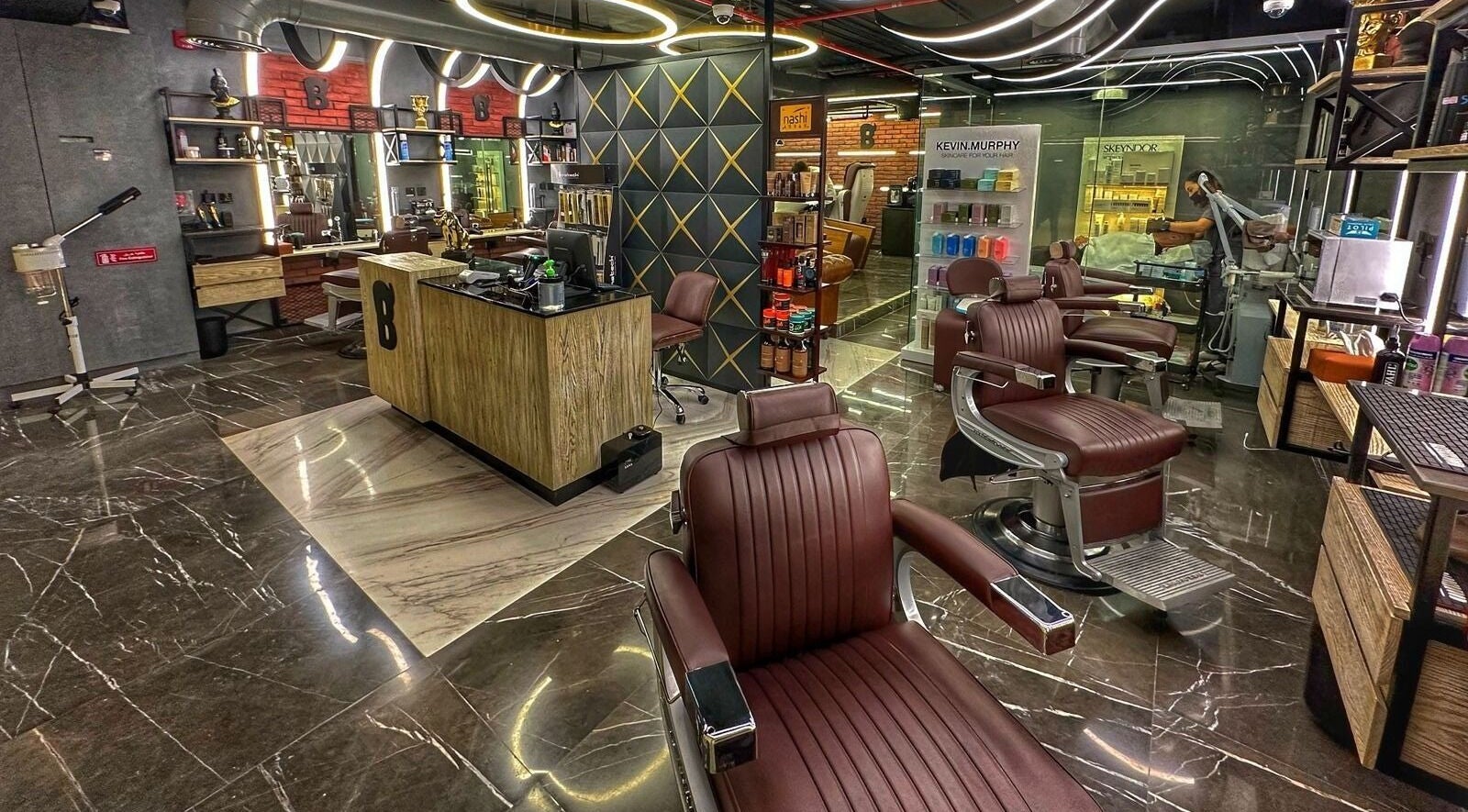 Modern barber interior at Bekky Barber - Dubai Hills Mall, Dubai, AE featuring stylish chairs and decor.