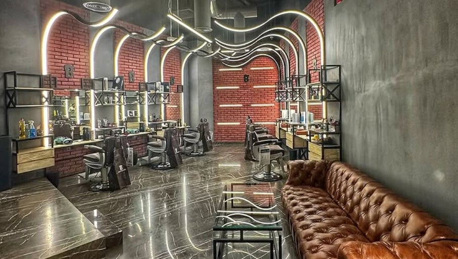 Interior of Bekky Barber - Marina View in Dubai, Dubai, AE. Stylish modern design with sleek barber chairs.