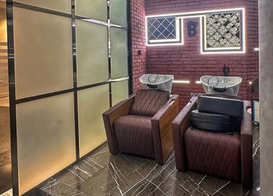 Stylish salon wash stations at Bekky Barber - Marina View in Dubai, Dubai, AE, featuring modern decor.