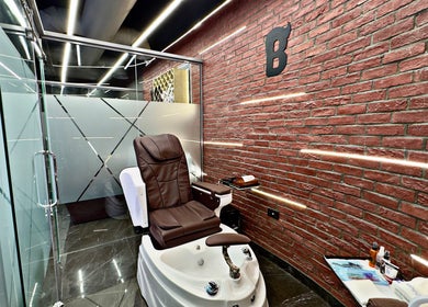Luxurious pedicure chair at Bekky Barber - Marina View in Dubai, Dubai, AE with a sleek modern interior.