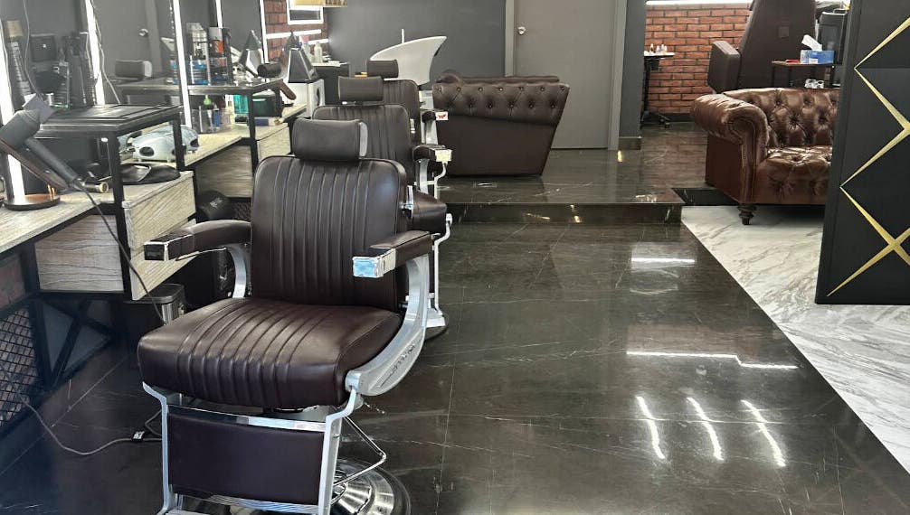 Bekky Barber - The Valley features sleek chairs and modern decor at 'ud Al Bayda', Dubai, AE.