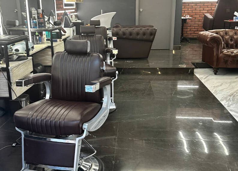Bekky Barber - The Valley features sleek chairs and modern decor at 'ud Al Bayda', Dubai, AE.