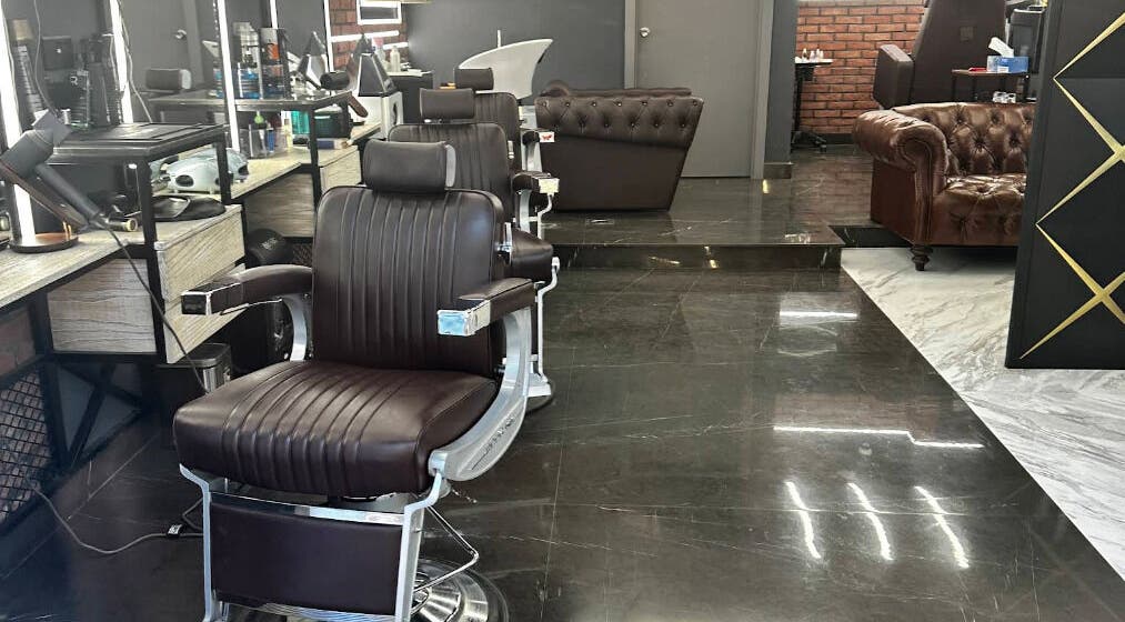 Bekky Barber - The Valley features sleek chairs and modern decor at 'ud Al Bayda', Dubai, AE.