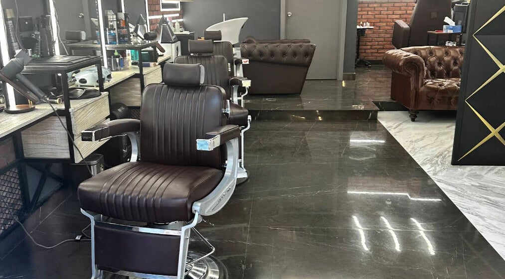 Bekky Barber - The Valley features sleek chairs and modern decor at 'ud Al Bayda', Dubai, AE.