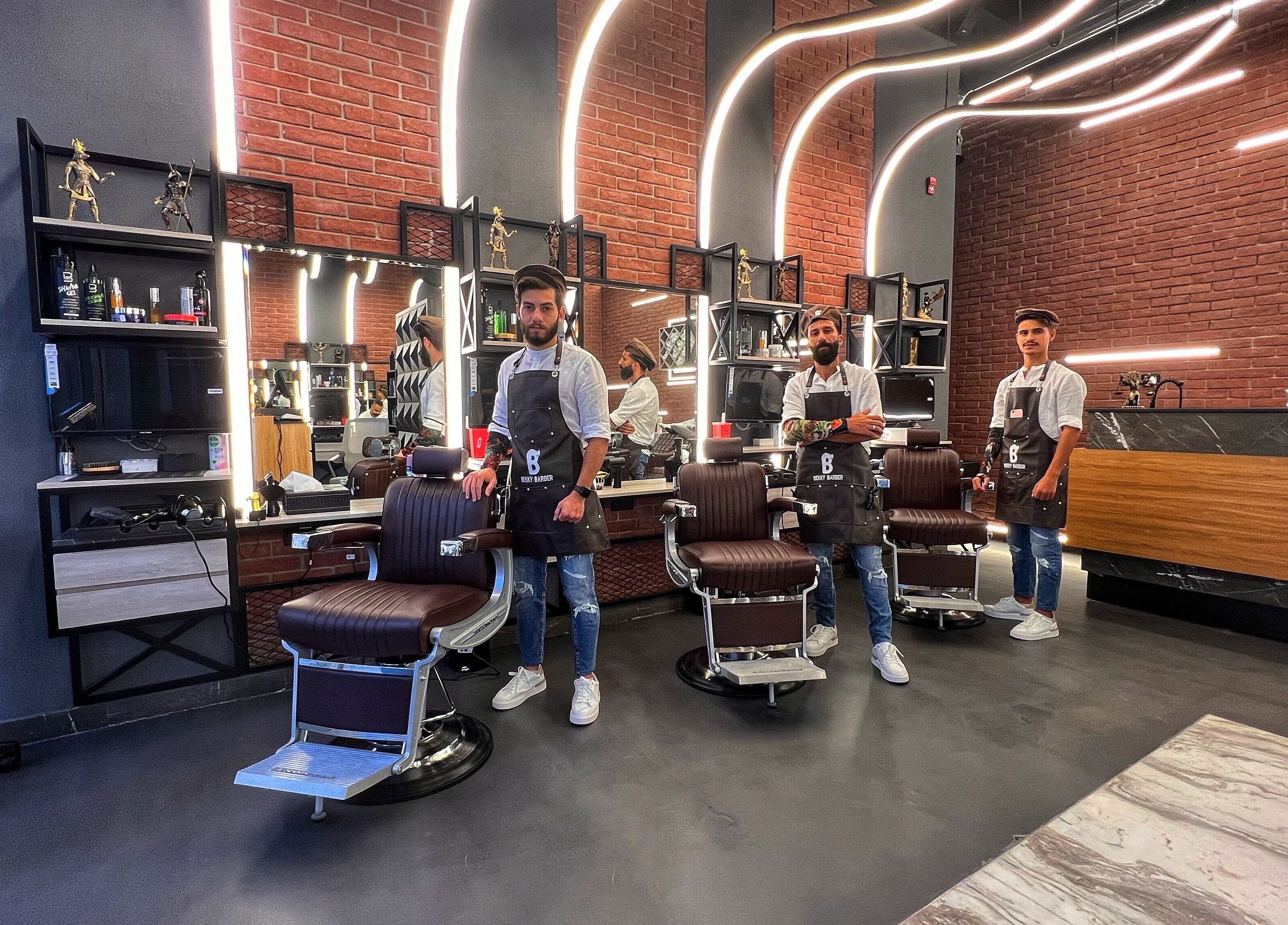 Stylish barbers at Bekky Barber - Beach Front, Dubai, AE offer premium grooming services.