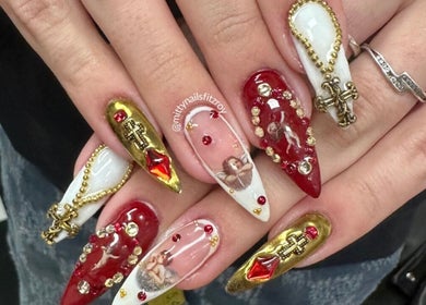 Intricate nail art design at Fitzroy - Mitty Nails & Beauty, Melbourne, Victoria, AU with gold and red embellishments.