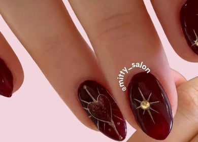 Intricate nail art design at Fitzroy - Mitty Nails & Beauty, Melbourne, Victoria, AU, featuring bold colors.
