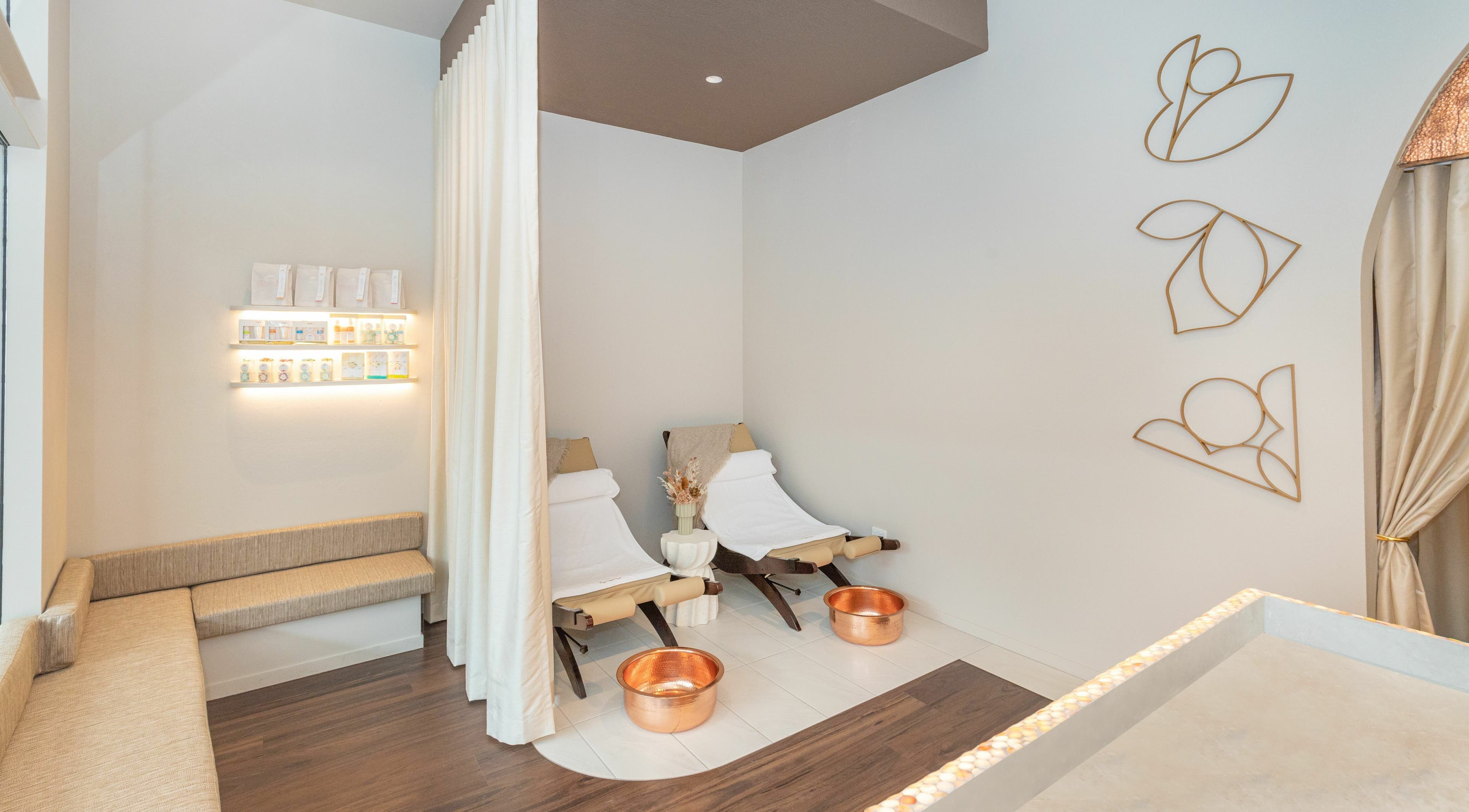 Relaxation area at Thai Fusion Spa in Surfers Paradise, Queensland, AU with cozy chairs and serene decor.