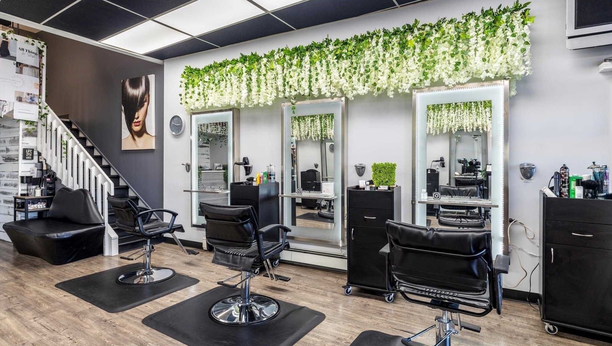 Modern styling chairs and mirrors at Michele’s Station Square Hair Salon, Rutherford, New Jersey, US.