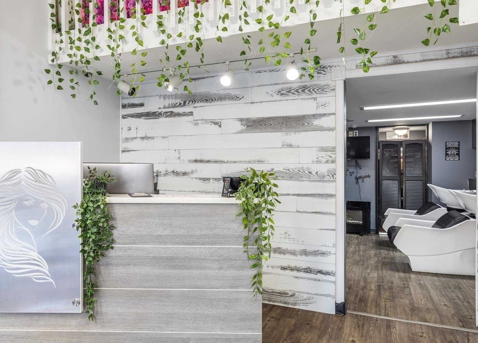 Michele’s Station Square Hair Salon in Rutherford, New Jersey features a stylish reception with chic design.