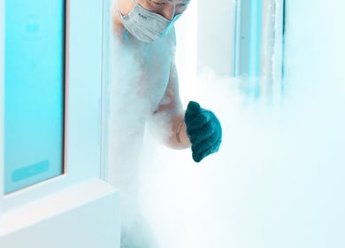 Customer experiencing cryotherapy at CRYO Hong Kong, Hong Kong Island, HK, immersed in soothing mist.