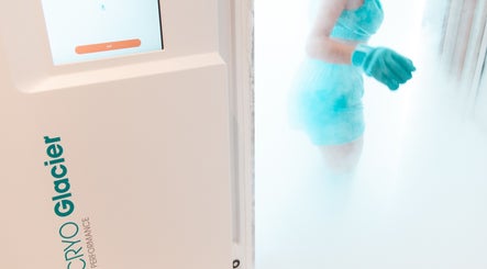 Cryotherapy session at CRYO Hong Kong on Hong Kong Island, HK, showcasing icy mist and modern equipment.