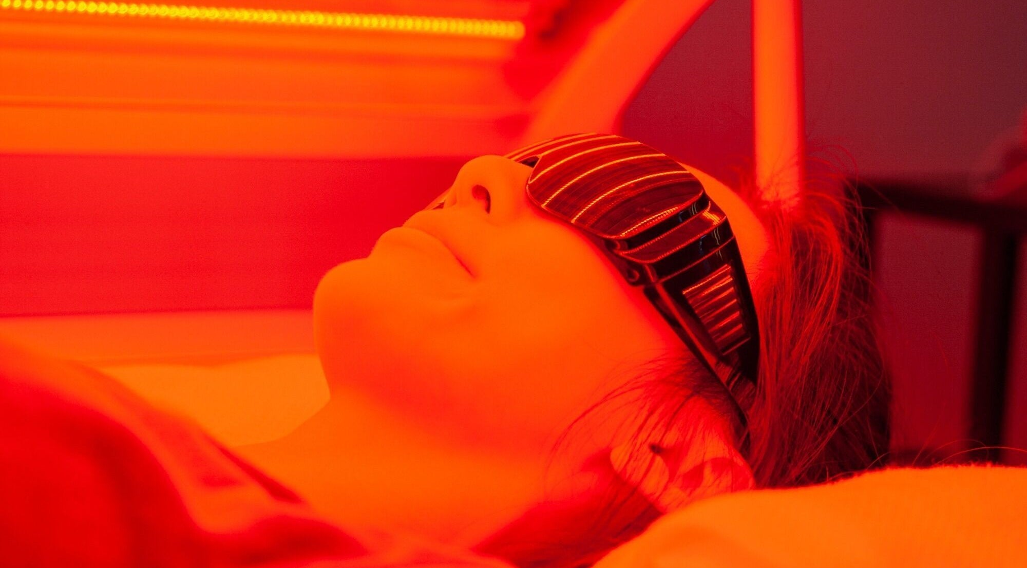 Individual enjoys red light therapy at CRYO Hong Kong, Hong Kong Island, HK for wellness enhancement.