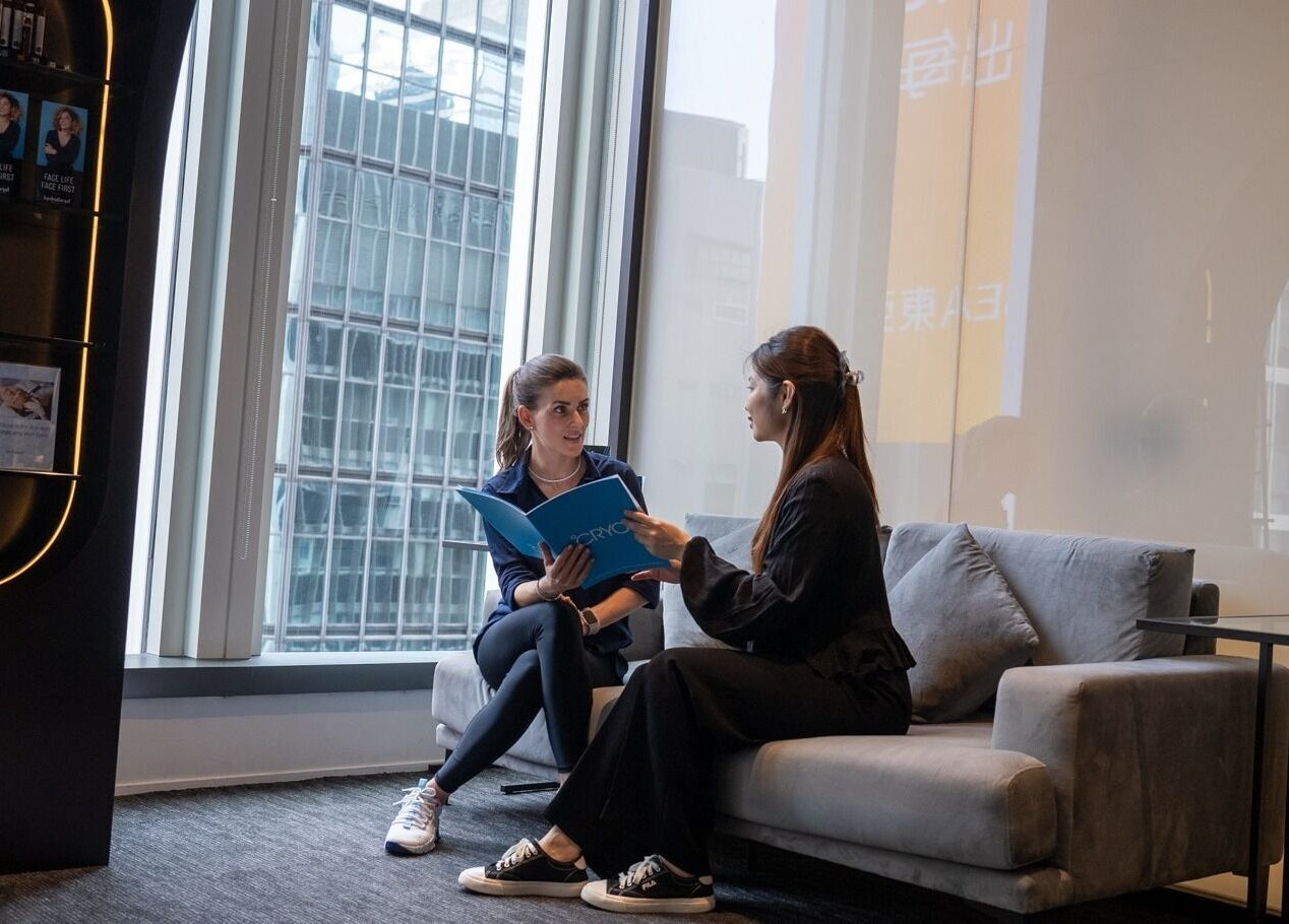 Two women discussing treatment plans at CRYO Hong Kong, Hong Kong Island, HK.