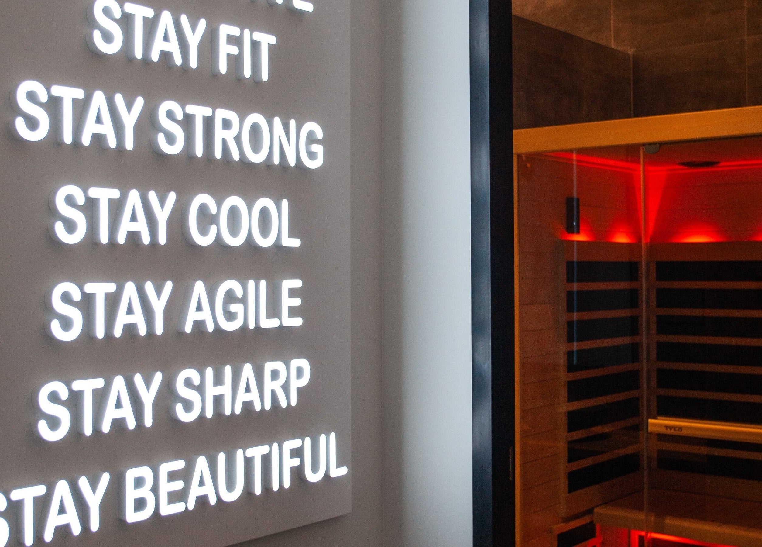 Illuminated motivational sign and infrared sauna at CRYO Hong Kong, Hong Kong Island, HK.