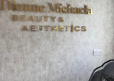 Beauty by Dionne's elegant wall sign in Stockport, England, GB showcasing beauty and aesthetics services.