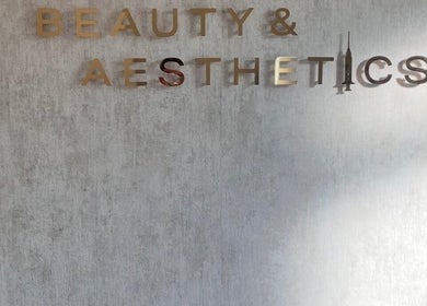 Beauty by Dionne's elegant wall sign at Stockport, England, GB welcomes clients to a serene environment.