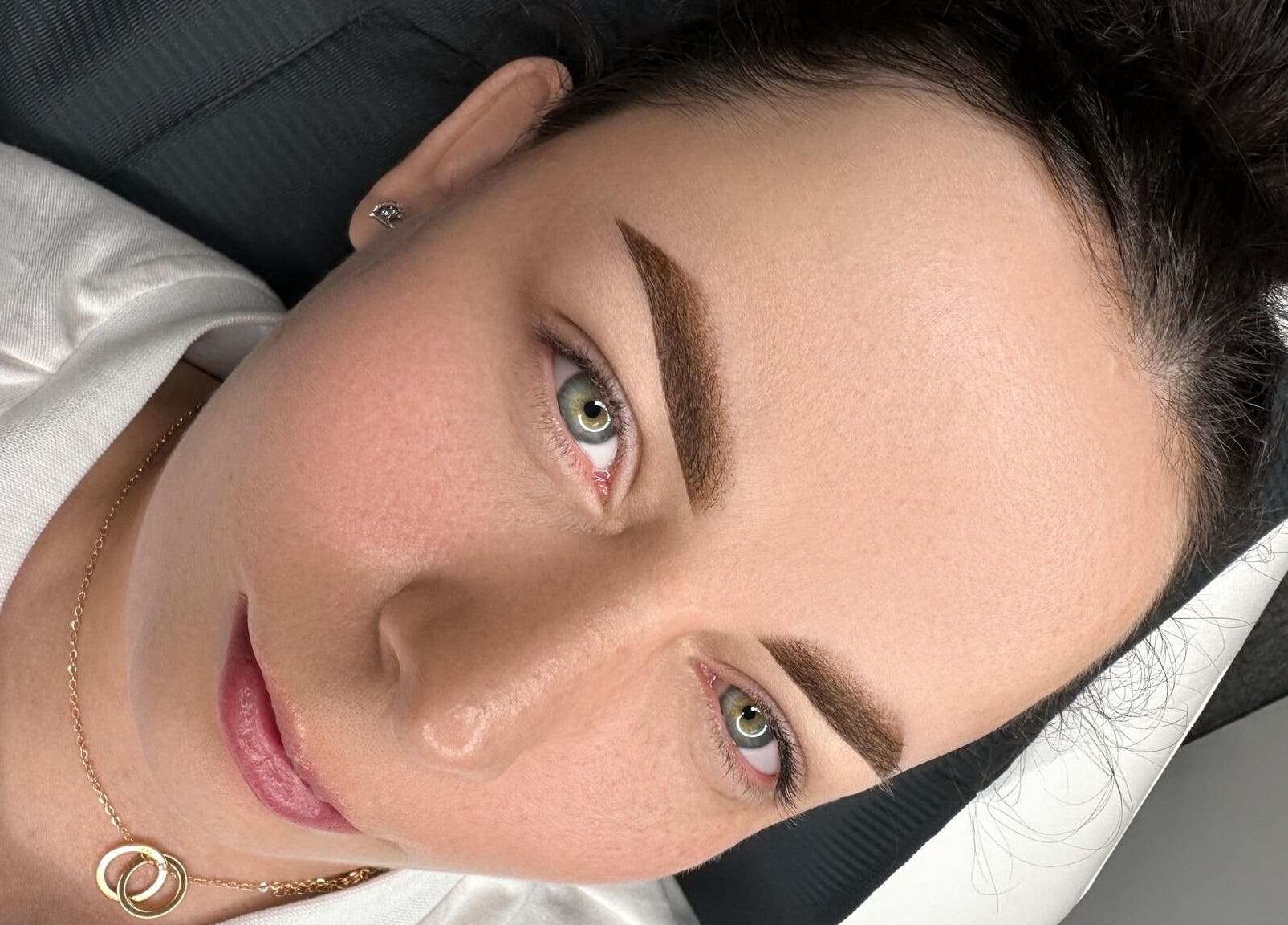 Close-up of elegantly shaped eyebrows at Glowmeup, Rochdale, England, GB in a serene setting.