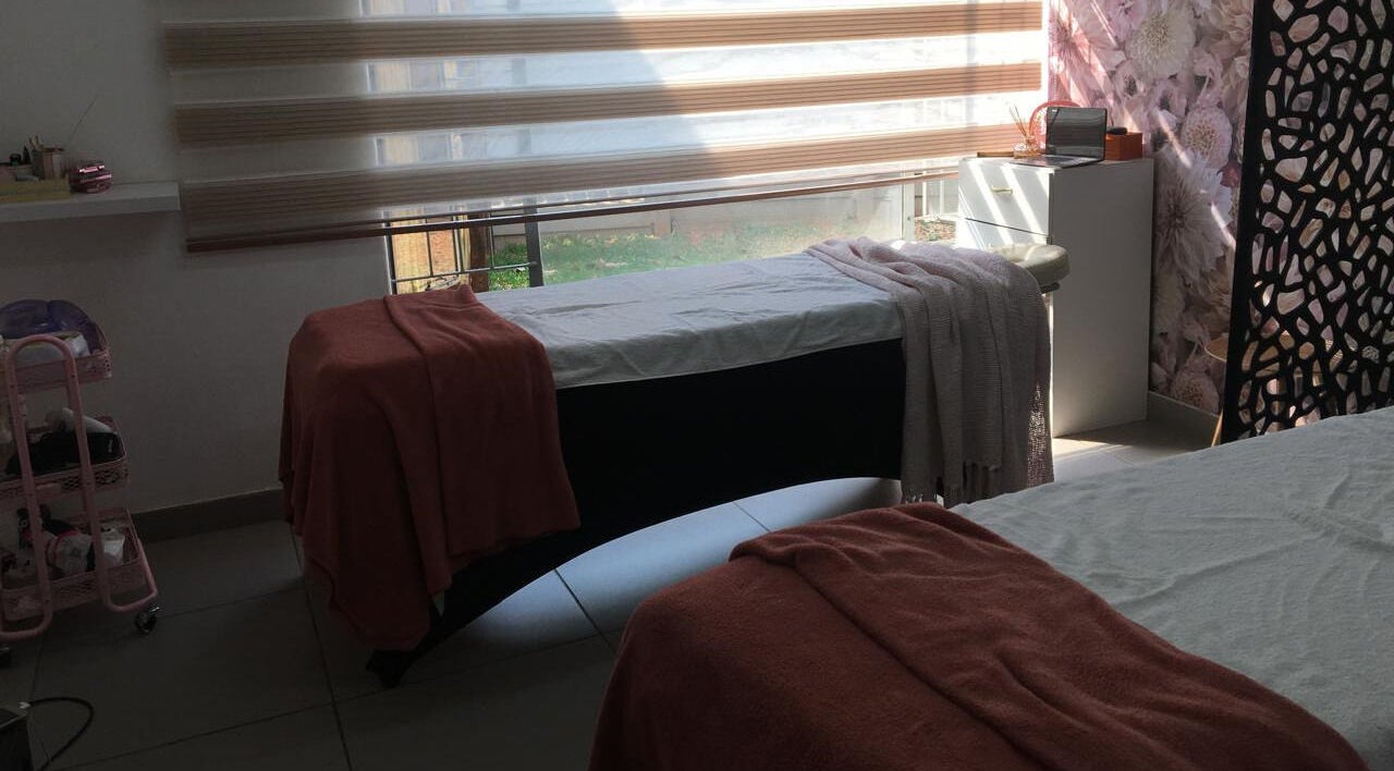 Cozy massage beds at O'riain Beauty, Pretoria, Gauteng, ZA, offering a peaceful spa retreat.