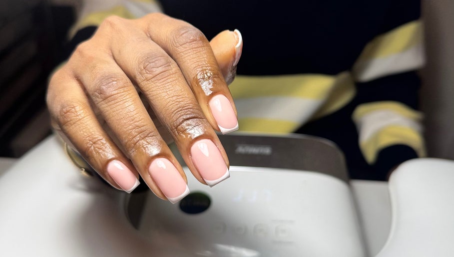 Elegant French manicure at It’s a Gel Thing, Birmingham, England, GB. Perfectly polished, stylish nails.