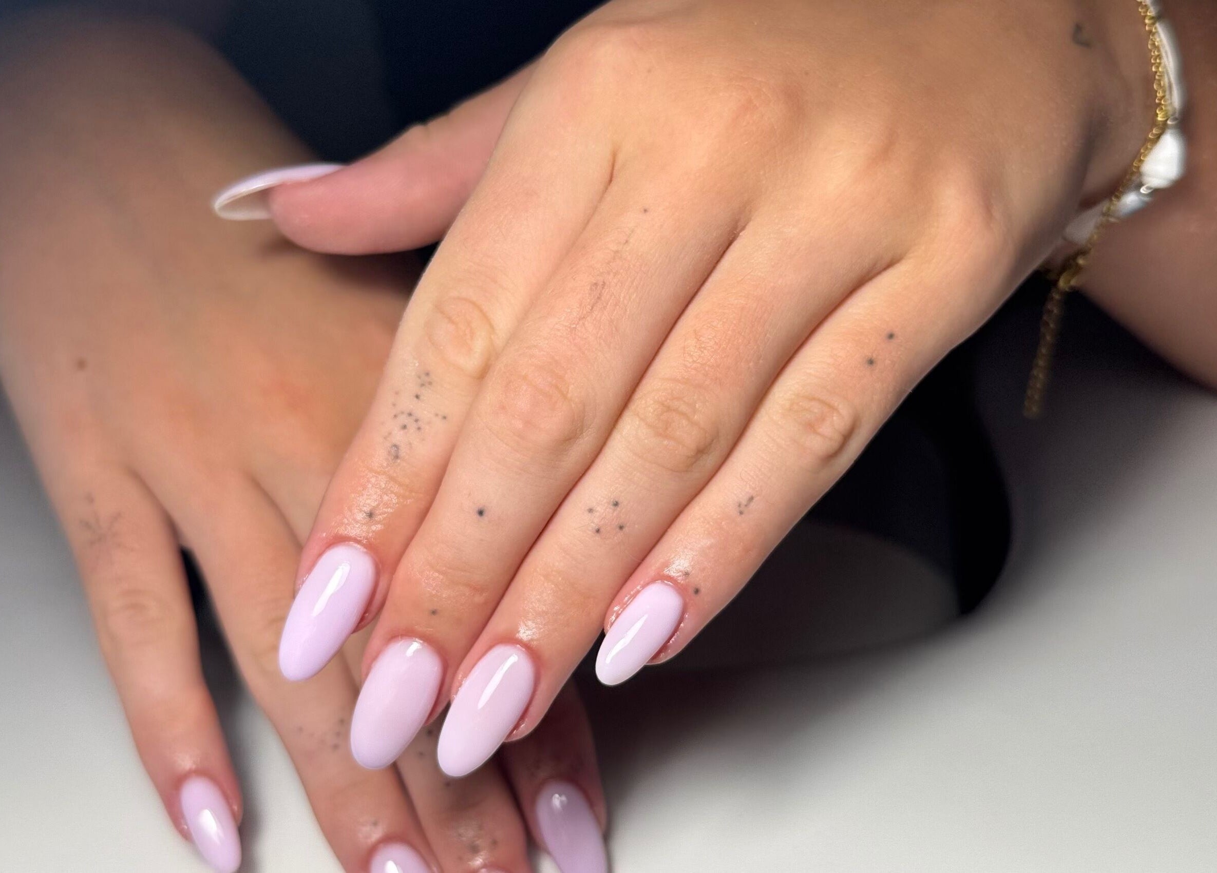 Elegant lavender nails at It’s a Gel Thing, Birmingham, England, GB, showcasing detailed hand artistry.