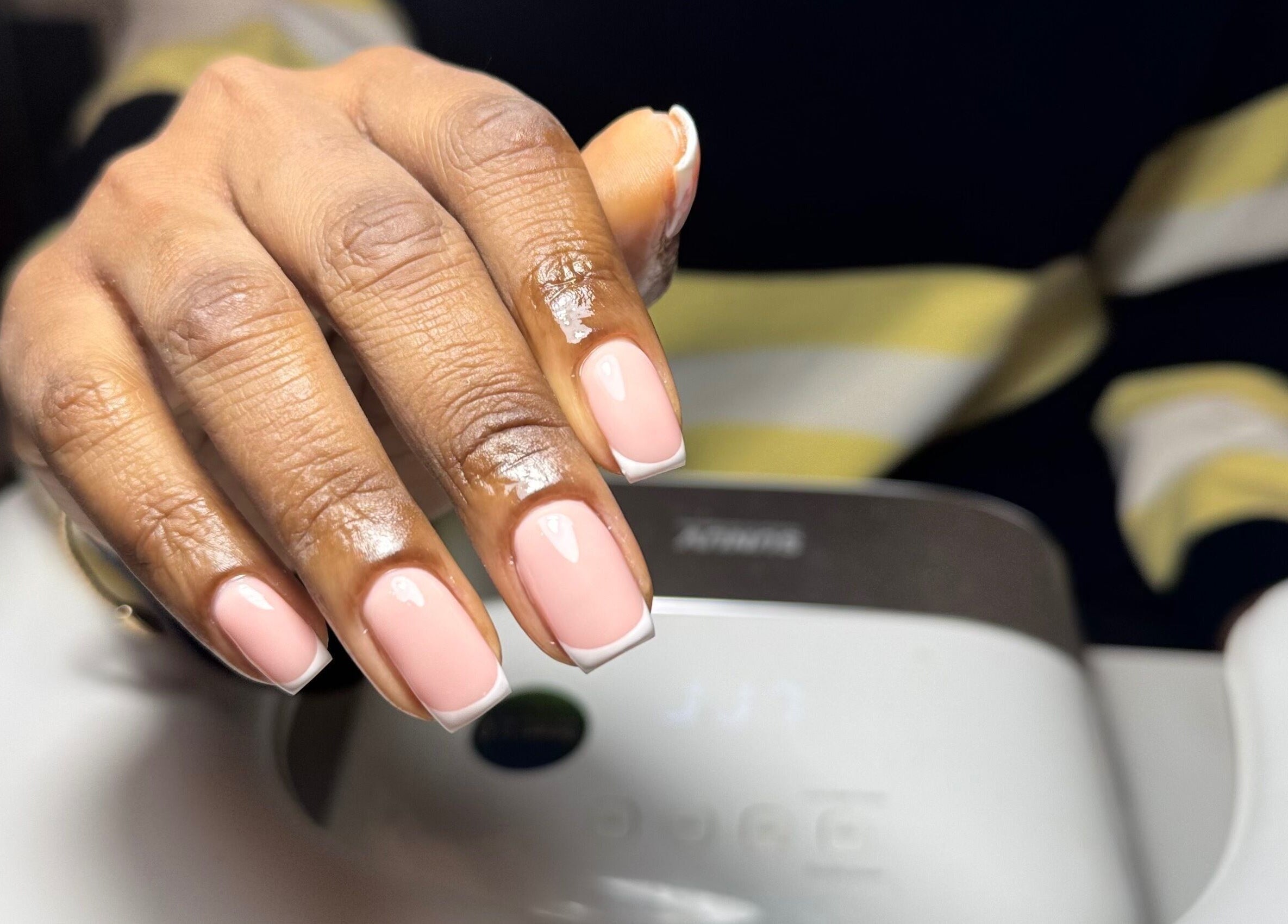 Elegant French manicure at It’s a Gel Thing, Birmingham, England, GB; showcasing perfect nail care.