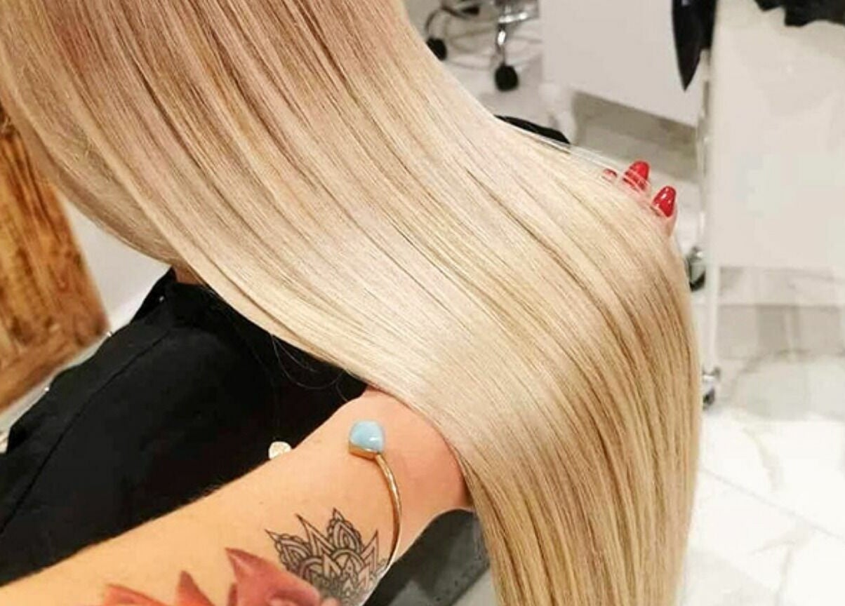 Sleek, silky blonde hair styling at Jade Slater Hair Design, York, England, GB.