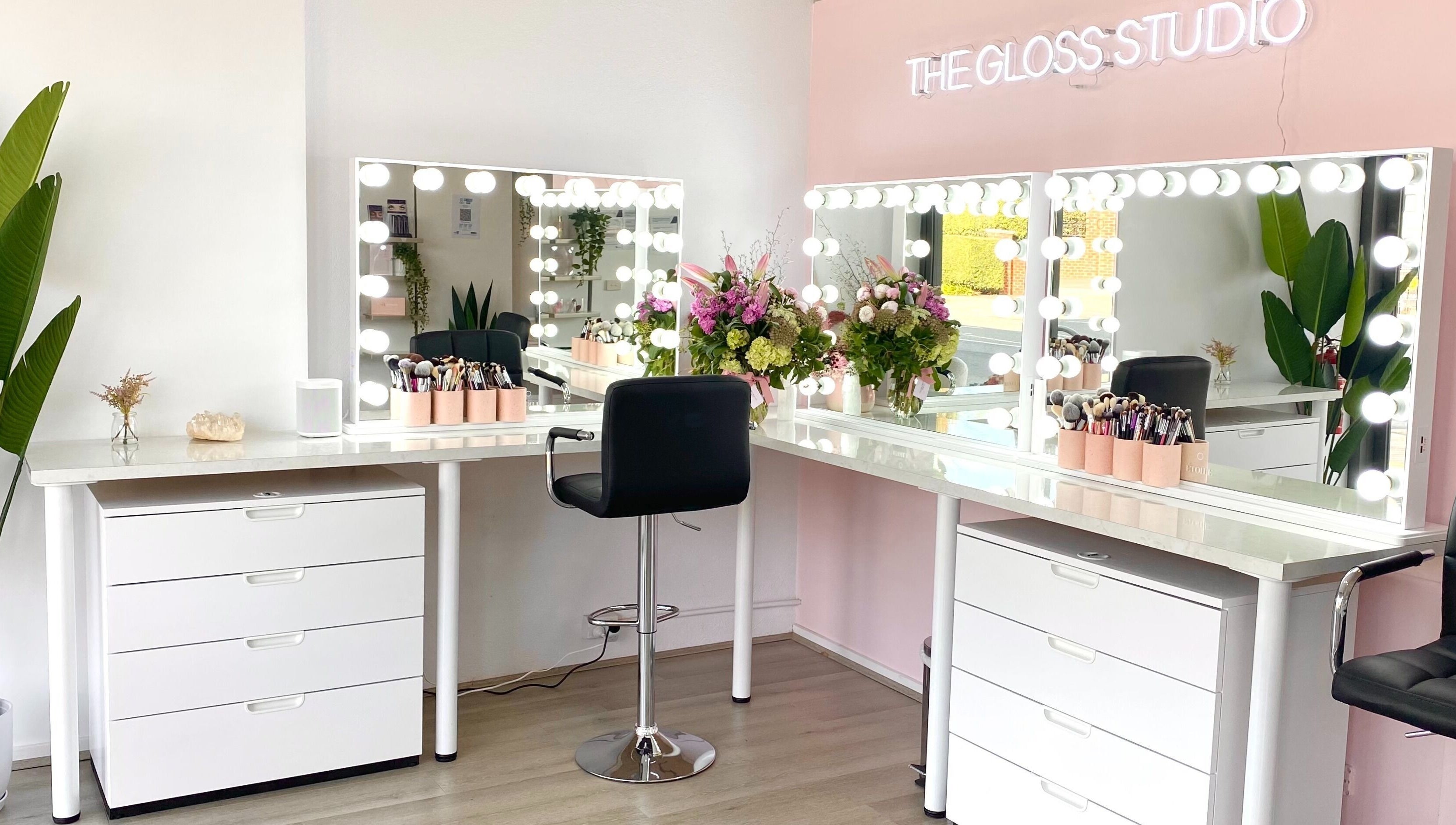 Luxurious makeup stations at The Gloss Studio in Lower Plenty, VIC, AU featuring elegant mirrors and decor.