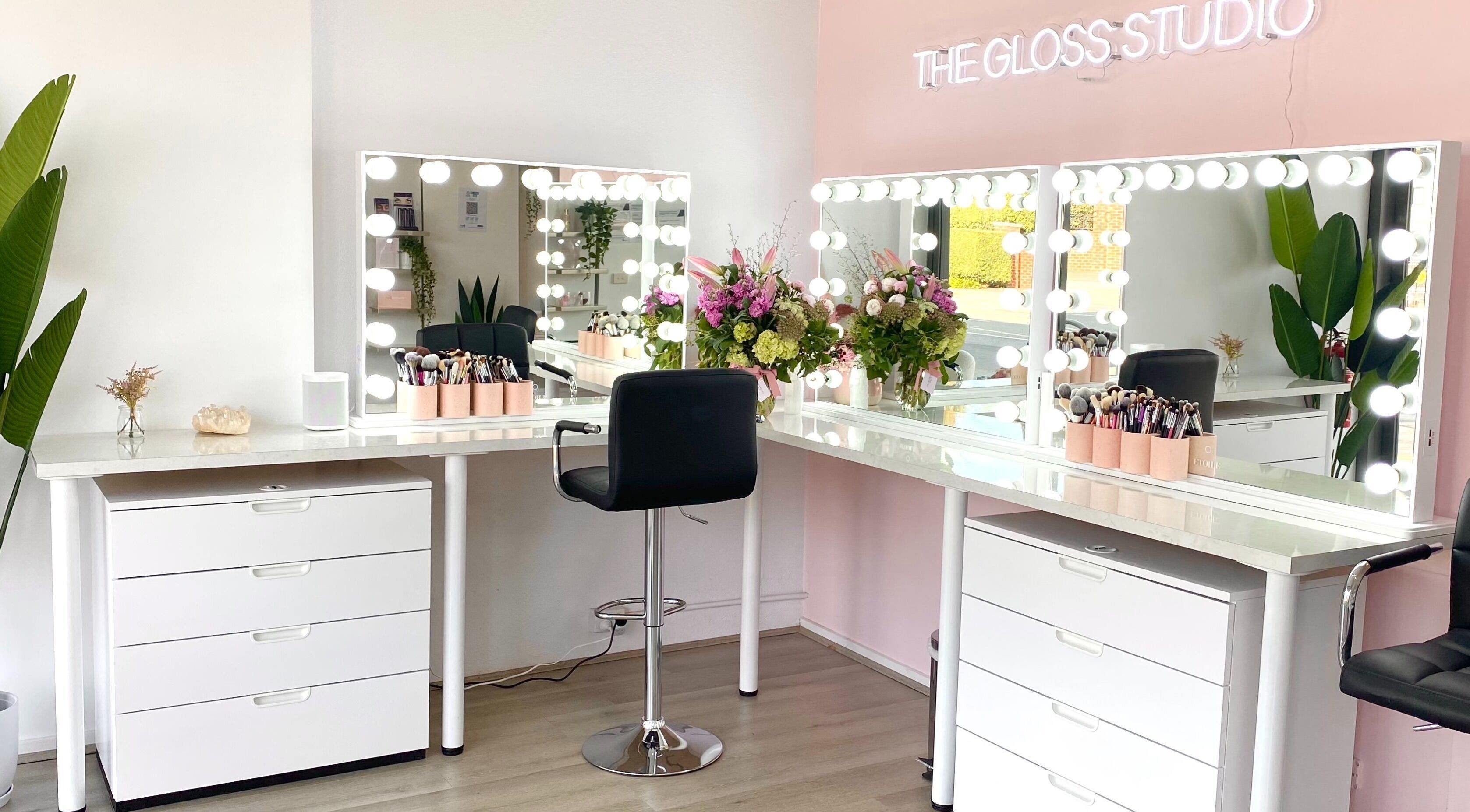 Luxurious makeup stations at The Gloss Studio in Lower Plenty, VIC, AU featuring elegant mirrors and decor.
