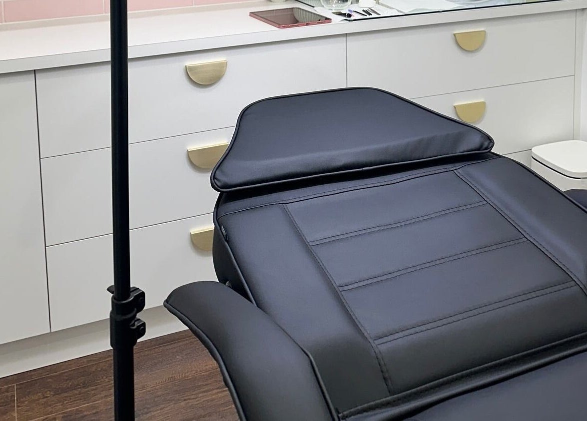 Elegant treatment chair in The Gloss Studio, Lower Plenty, VIC, AU, offering a serene wellness experience.