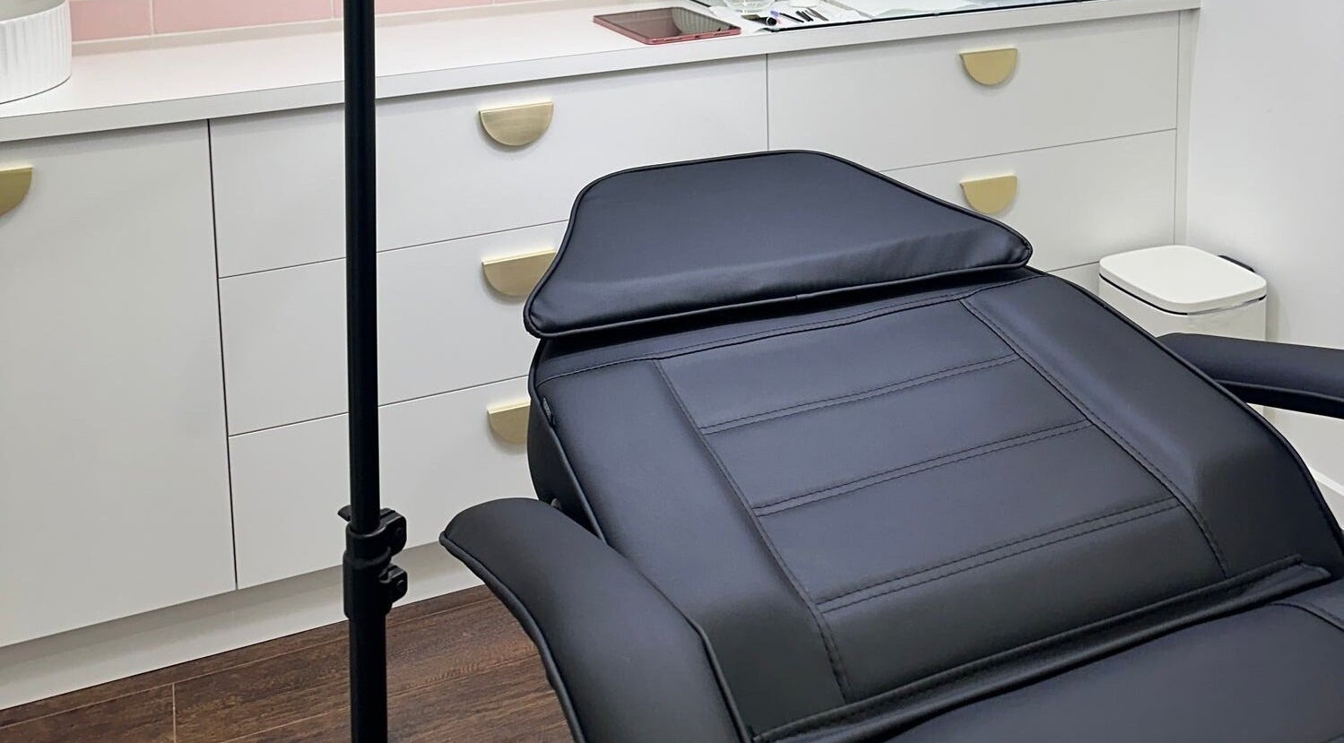 Elegant treatment chair in The Gloss Studio, Lower Plenty, VIC, AU, offering a serene wellness experience.