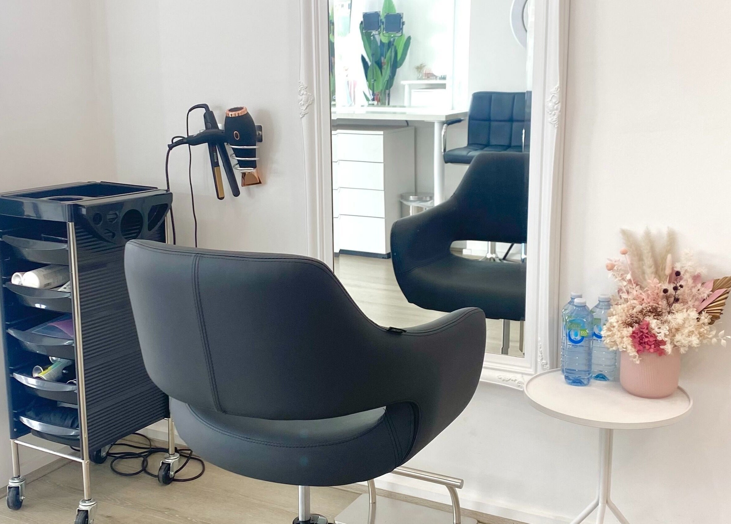Chic styling chair and elegant mirror setup at The Gloss Studio, Lower Plenty, VIC, AU.