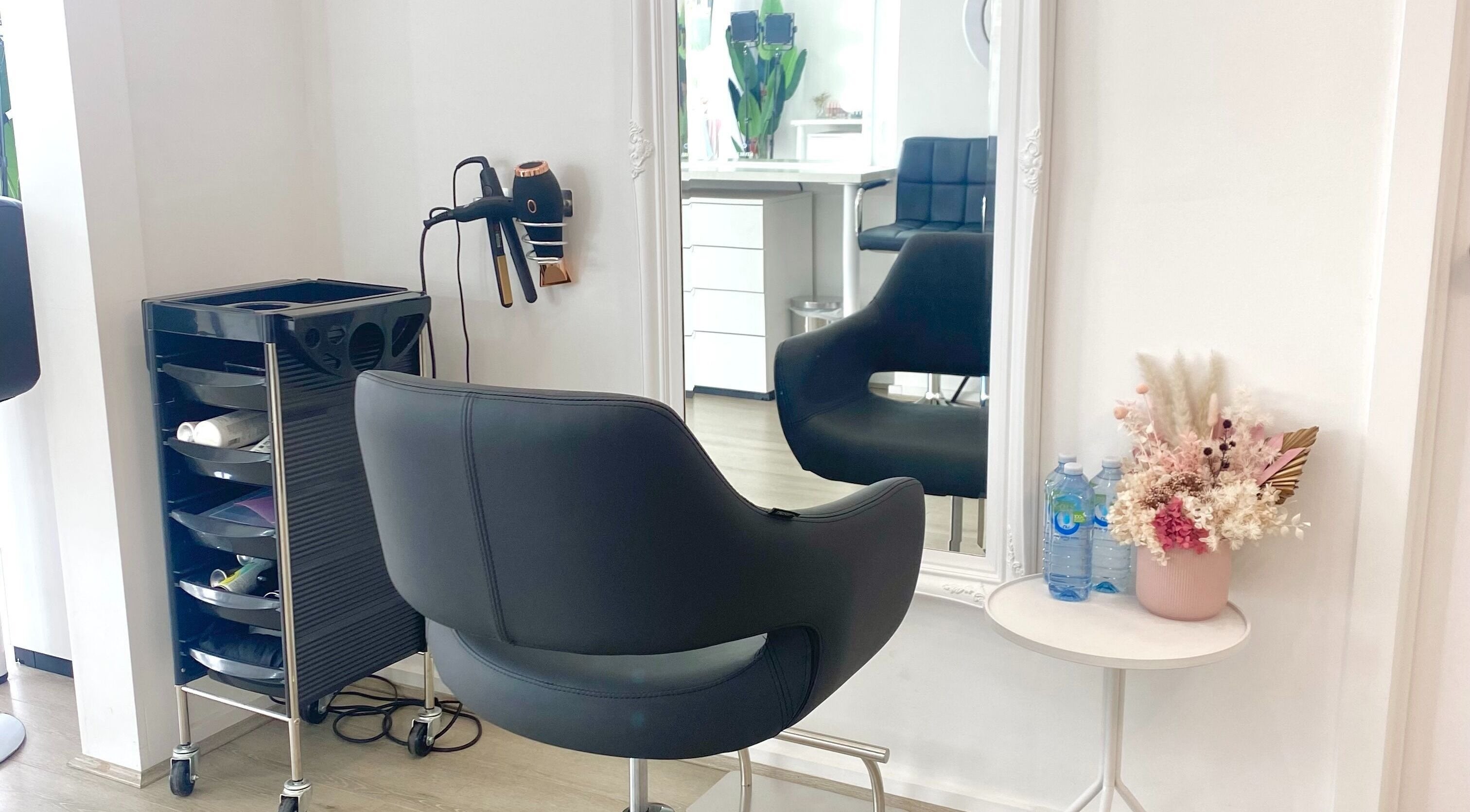 Chic styling chair and elegant mirror setup at The Gloss Studio, Lower Plenty, VIC, AU.