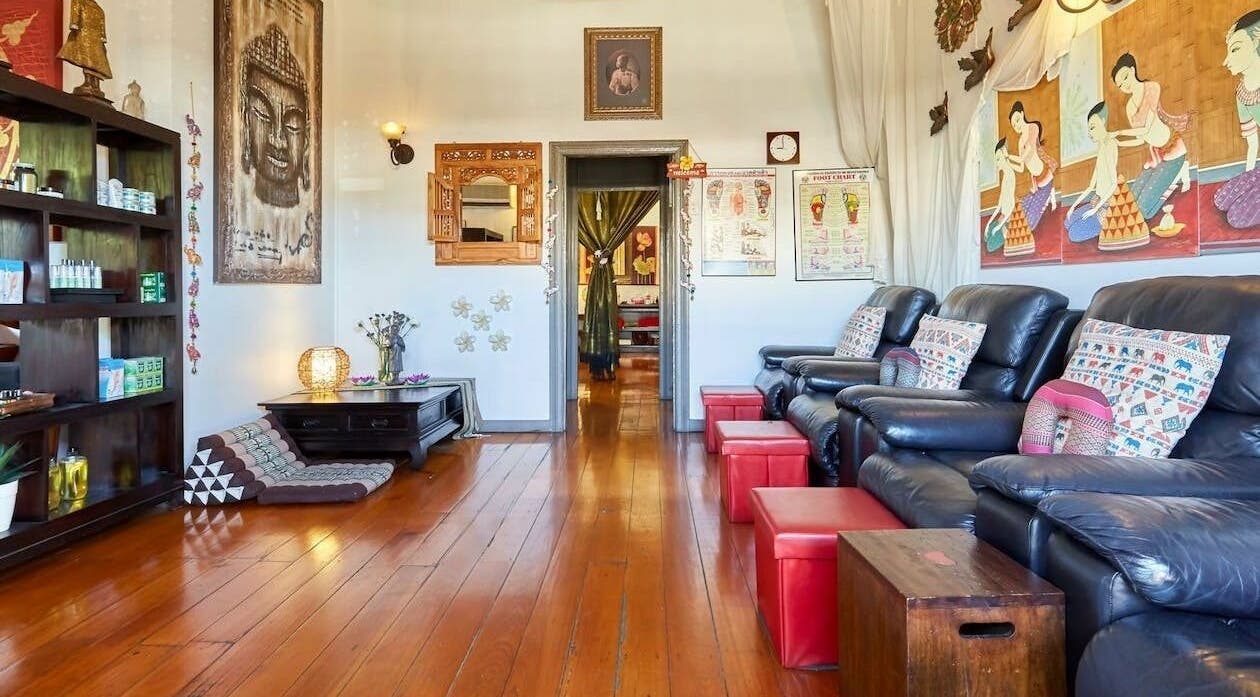 Cozy seating area at Healing Hands Thai Massage and Spa, East Brisbane, Queensland, AU, showcasing Thai decor.