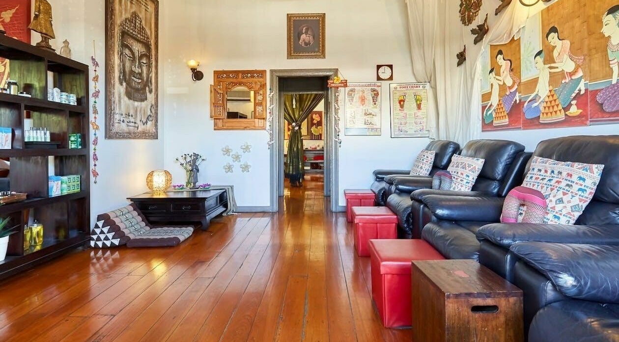 Cozy seating area at Healing Hands Thai Massage and Spa, East Brisbane, Queensland, AU, showcasing Thai decor.