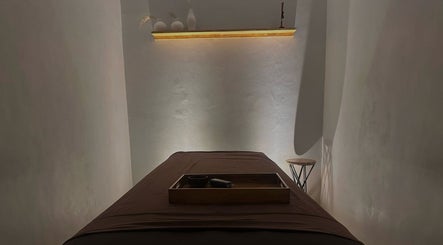 Peaceful spa room with a massage table at Koya Spa Seminyak, Bali, Bali, ID, offering ultimate relaxation.