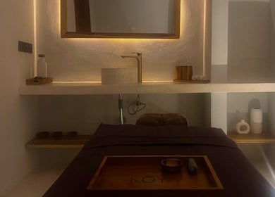 Elegant massage room setup at Koya Spa Seminyak, Bali, Bali, ID featuring a cozy, inviting atmosphere.