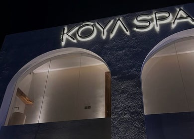 Illuminated facade of Koya Spa Seminyak in Bali, Bali, ID, showcasing modern aesthetic.