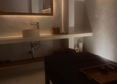 Serene interior of Koya Spa Seminyak in Bali, Bali, ID featuring a massage table and elegant decor.