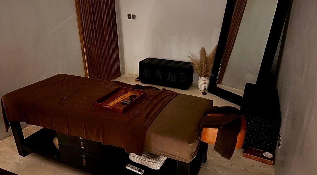 Tranquil massage room at Koya Spa, Bali, Bali, ID featuring a cozy massage table and soothing decor.