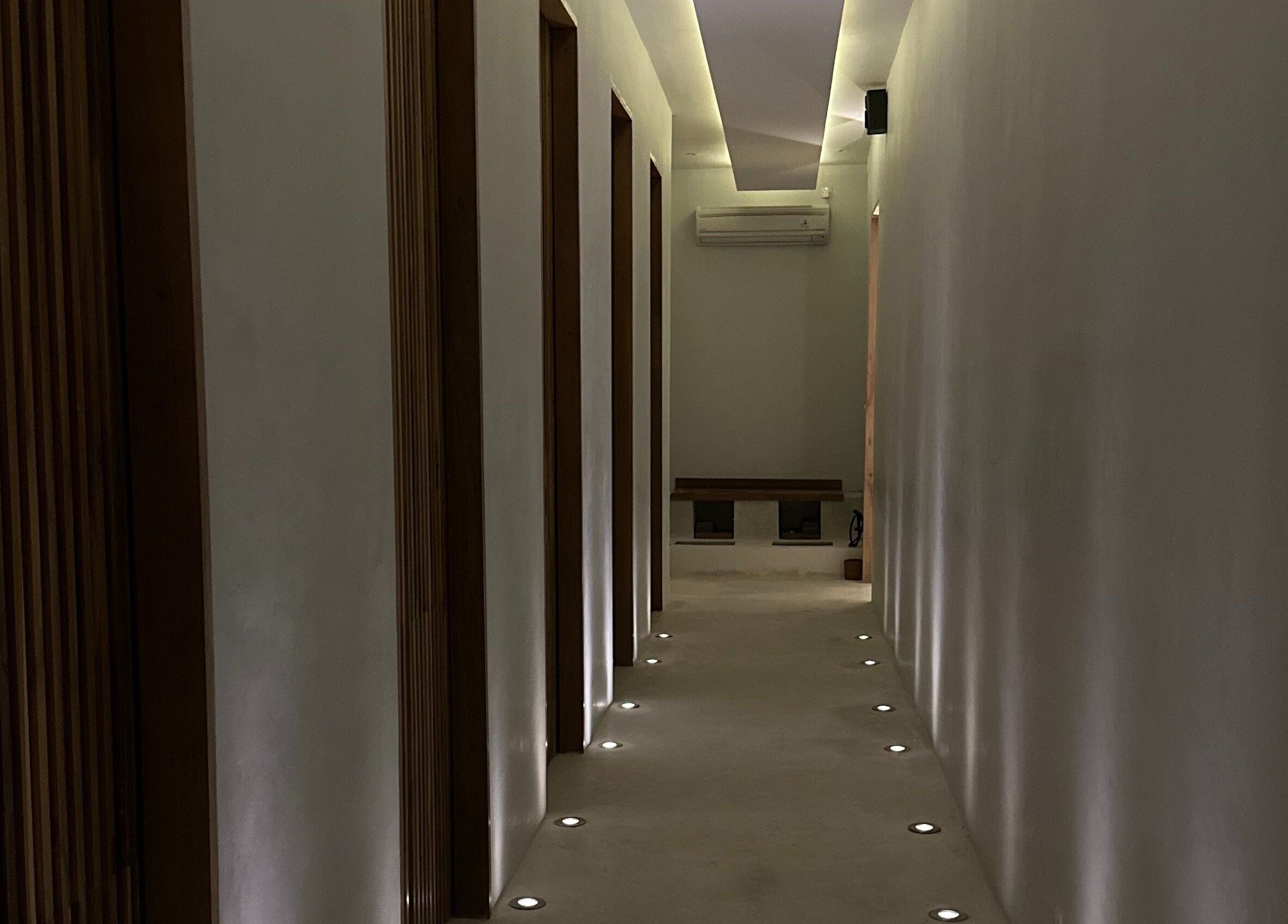 Elegant hallway at Koya Spa, Bali, Bali, ID featuring ambient lighting and minimalist design.