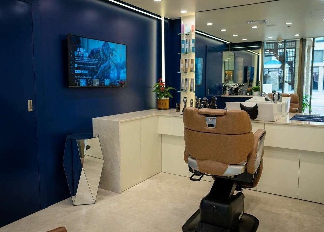 Modern interior of Shuffle Gents Barber in Mubarak Al-kabeer Governorate, offering premium grooming services.
