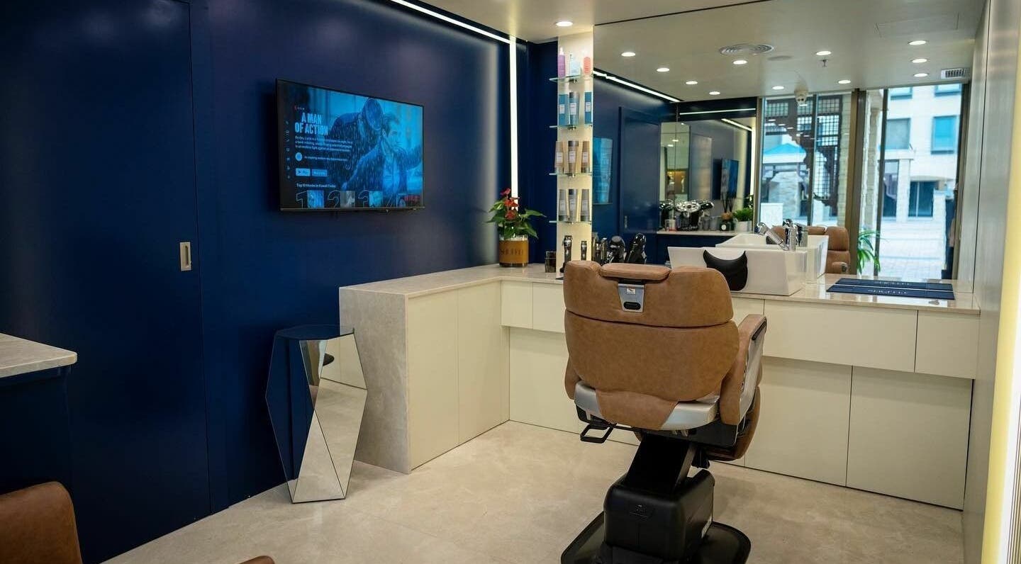 Modern interior of Shuffle Gents Barber in Mubarak Al-kabeer Governorate, offering premium grooming services.