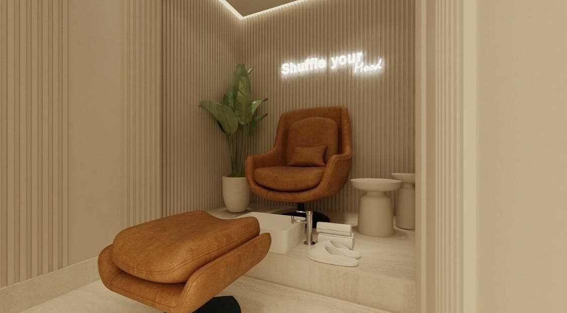 Comfortable seating at Shuffle Gents Barber, Mubarak Al-kabeer Governorate, for a relaxing experience.