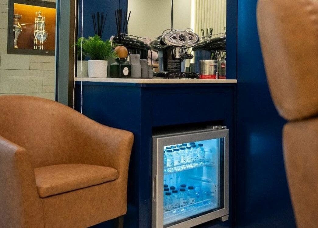 Elegant seating area at Shuffle Gents Barber in Mubarak Al-kabeer Governorate, KW, featuring stylish decor.