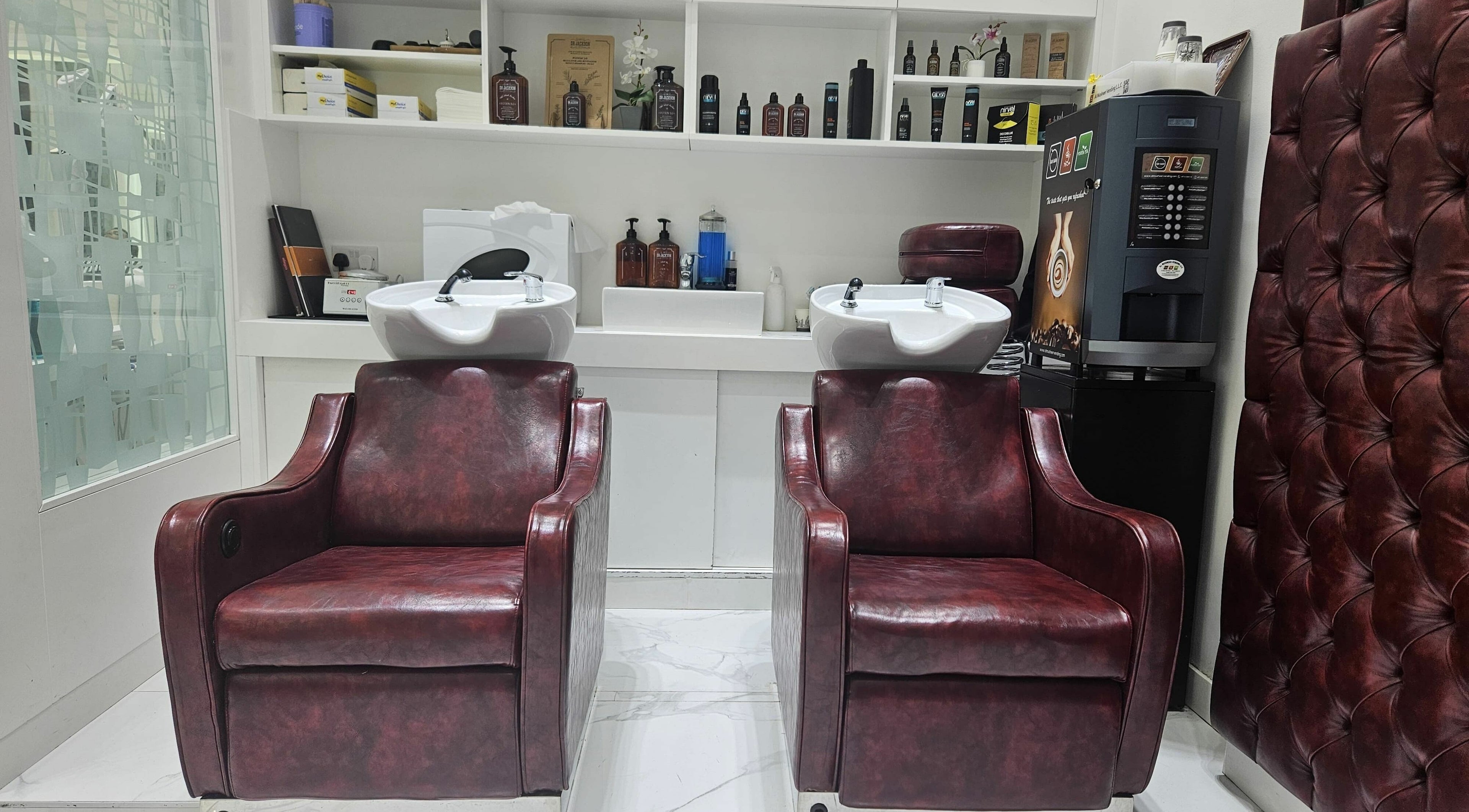 Luxurious barber chairs at Groomen Barbershop - Ibn Battuta Mall, Dubai, Dubai, AE offer comfort and style.