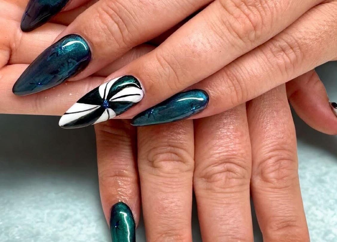 Stylish dark green and black nail art at Afterglow Beauty, Cambridge, England, GB.