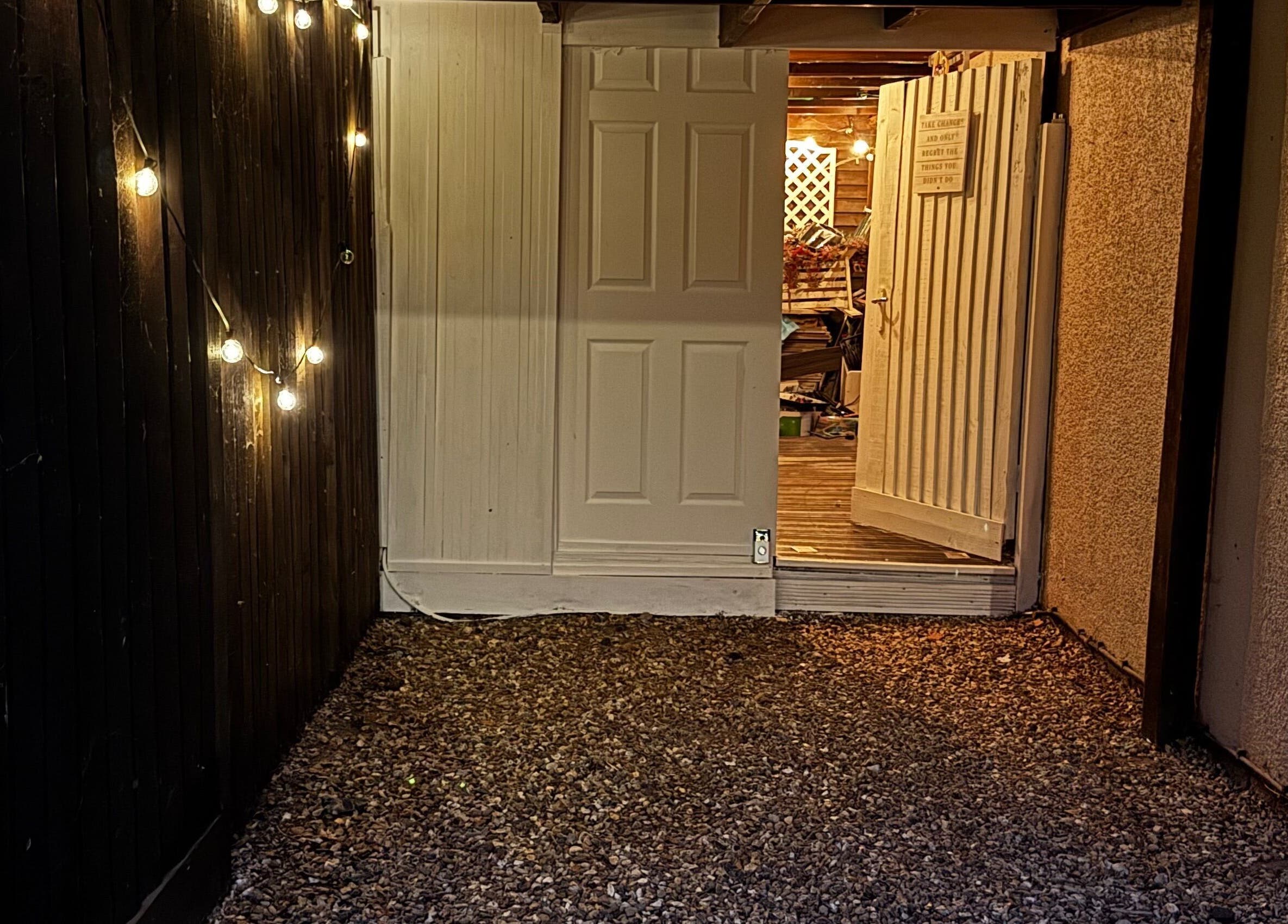 Charming entrance with string lights at Afterglow Beauty, Cambridge, England, GB.